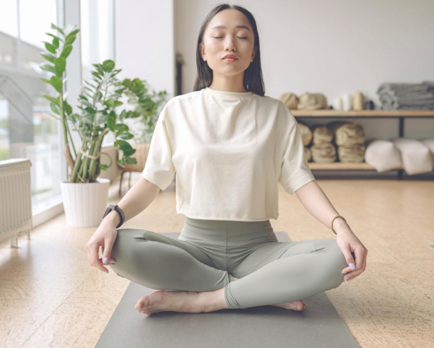 Yoga energy flow practice session showing students in guided movement